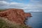 Red Otter Sandstone cliffs at Danger Point, walking east from Otterton Ledge, Devon