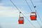 Red Overhead Cable Cars Blue Sky