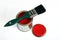 Red paint and green brush