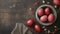 Red painted Easter eggs with flowers on dark rustic background
