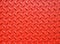 Red painted industrial metal plate industrial diamond pattern grip texture