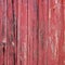 Red painted weathered wood stripes