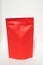 Red paper doy pack with a metallic zipper lock. Colorful matte red storage bag