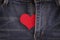 Red paper heart appears out in jeans fly