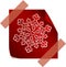 Red paper snowflake over red sticker