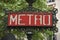 Red Paris metro subway entry sign