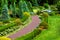 Red pavement walkway in the backyard.