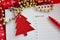 Red Pen Point to Blank Wish List Decorated with Christmas Tree paper cut