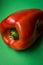 Red pepper on a green platform