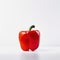A red pepper sitting on top of a white table. AI generative image.