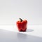 A red pepper sitting on top of a white table. AI generative image.