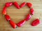 Red Peppers in a Heart on Cutting Board