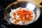 Red peppers and onions sauteing in fry pan