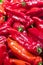 Red peppers. Raw vegetables and fruits background. Healthy organic food concept. A group of fresh and clean red peppers. vertical