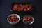 Red peppery snack of dried shrimp. A delicious appetizer for shrimp beer on a black background