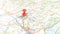 A red pin stuck in Lake Iseo on a map of Italy