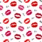 Red and pink lip marks isolated on white background trendy seamless pattern with word `kiss` in diffrent fonts. Vector illustratio