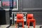 Red pizza sign and orange chairs in Portland, Oregon