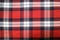 Red plaid textured textile cotton, shirt, tablecloth or picnic textile, geometric, square.