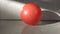 The red plastic balls that were on the floor where children played and were not tidied up and were still messy around the floor