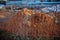 Red plastic caution fence with mesh during excavation or repair work in winter