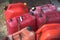 Red plastic fuel containers flammable liquid gasoline petrol