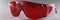 Red plastic safety glasses, protective workwear glasses for foreman worker