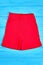 Red pocket cotton shorts for kids.