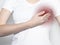 Red point of breast or chest ache. Pain in female body, mastopathy