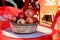 Red pomegranates on small table