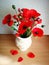 Red poppies bouquet vase on a table