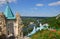 Red poppies on the mountain. View of the Holy Dormition svyatogorskaya Lavra