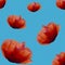 Red poppy flower patterned blue background