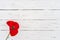 Red poppy flower on white wooden background for Rememberance Day with copy space