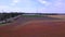 red poppyfield country road summer meadow Beautiful aerial top view flight drone