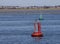 Red port and green starboard channel marker buoy