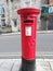 Red postbox on and England Street