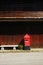 Red Postbox on footpath at countryside In Thailand