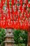 Red prayer ribbons and ancient Buddhist pagoda in Lingyin Temple