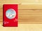 Red premium Chinese gift box for Chinese New Year, Anniversary, Mid-Autumn Festival, Valentine`s Day, Birthday. On wooden