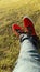 Red Puma shoes with grass HD wallpaper