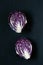 Red purple cabbages on a black background