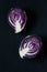 Red purple cabbages on a black background