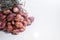 Red - purple shallot Bundle in studio light on the white marble surface table