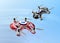 Red racing drones chasing in the sky