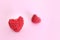 Red raspberry fruit Heart shapes on pink background  heart shaped from ripe fresh raspberries. Love and valentine day form food