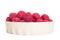 Red raspberry in a white bowl isolation. Toned in warm colors