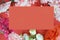 red rectangular frame for text on a background of flowerswith empty card for greeting message. Valentine's Day and