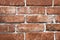 Red and red brick wall close. Template for designers