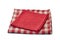 Red and red-checkered textile napkins on white background